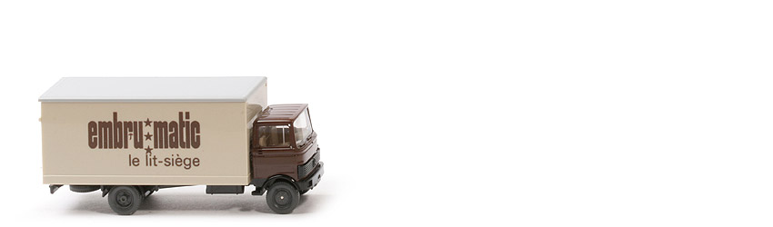 MB 809 Koffer-Lkw - Embrumatic Werbemodell FK schokobraun - Embru matic